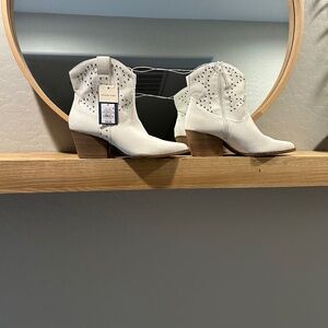 White boots with studs